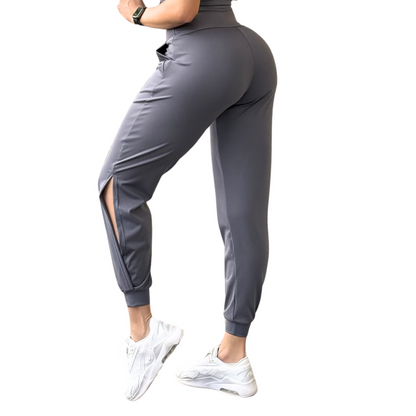 Pans Deportivos para Mujer Fitness: Efecto Básico, Cintura Alta, Con Bolsillos Laterales, Textil Lycra Transpirable con Acabado Liso, Color Gris | Adriana Olimpo