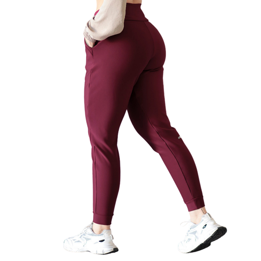 Pans Deportivos para Mujer Fitness: Efecto Básico, Cintura Alta, Con Bolsillos Laterales, Textil Lycra Transpirable con Acabado Liso, Color Tinto | Adriana Olimpo