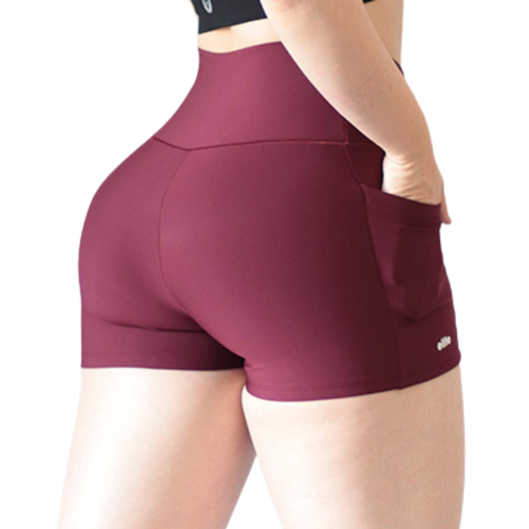 Short Mini Deportivos para Mujer Fitness: Efecto Básico, Cintura Alta, Con Bolsillos Laterales, Textil Lycra Transpirable con Acabado Liso, Vino | Adriana Olimpo