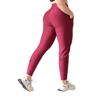 Pans Deportivos para Mujer Fitness: Efecto Basico, Cintura Alta, Con Bolsillos Laterales, Textil Lycra Transpirable con Acabado Liso, Color Tinto | Adriana Olimpo