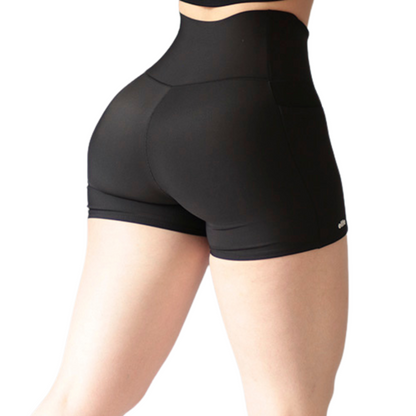 Short Mini Deportivos para Mujer Fitness: Efecto Básico, Cintura Alta, Con Bolsillos Laterales, Textil Lycra Transpirable con Acabado Liso, Color Negro | Adriana Olimpo